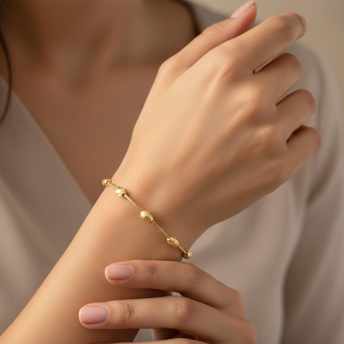 Sterling Silver Gold Plated Diamond-Cut Oval Bead Bracelet